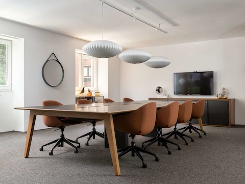 Layout meeting table with timber legs and Always Chairs in a meeting room setting.