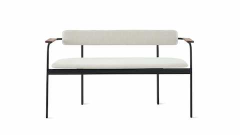 A Betwixt Bench with grey fabric seat and backrest, with walnut arms and a black frame.