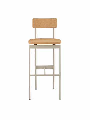 A bar-height Betwixt Stool with a cork seat and backrest with a grey frame.