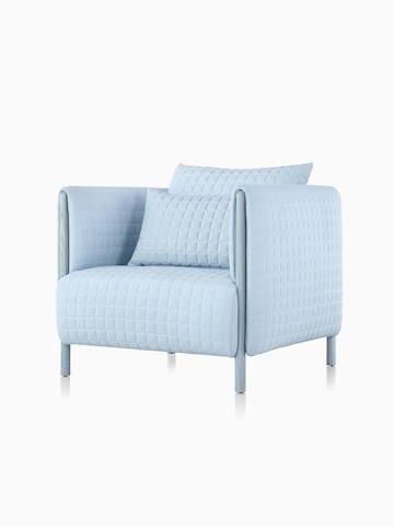 A light blue ColourForm lounge chair, viewed from a 45-degree angle. 