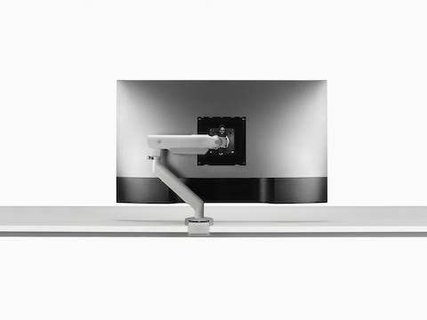 Silver Flo X Single monitor arm with a 43'' screen, viewed from the back.