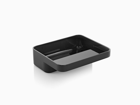 Angled view of the small version of a black Formwork Tray with a deep rear compartment and cantilevered front compartment.