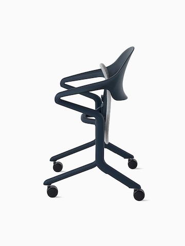 Profile view of a Fuld Nesting Chair in Nightfall with the seat folded up.