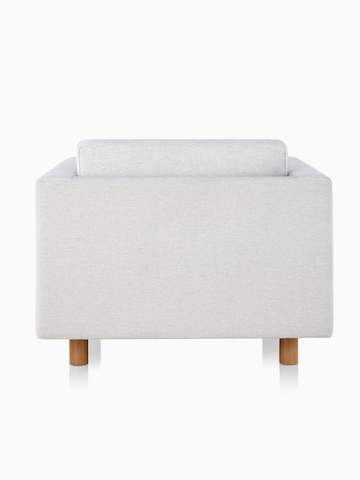 A light grey Lispenard club chair with fabric upholstery and light wood legs, viewed from behind.
