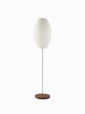 A white Nelson Cigar Lotus Floor Lamp with a medium shade and a walnut-covered steel base.