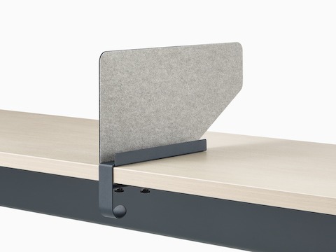 Grey OE1 Boundary Screen with liner on a white OE1 Rectangular Table, viewed from an angle.