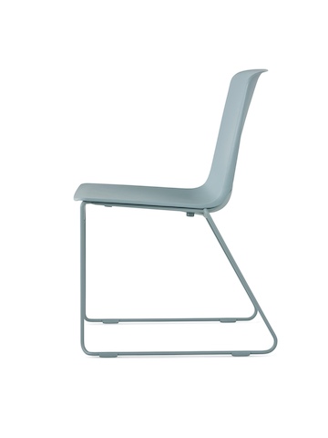 A glacier Pronta Stacking Chair with a dipped-in-colour shell and base.
