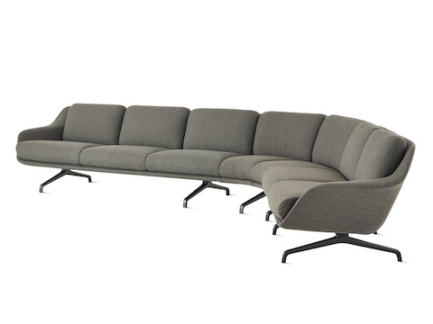 A Striad Modular Three-Seat Sofa with wedge in dark grey.