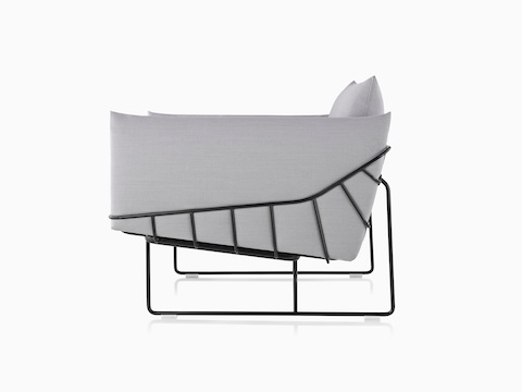 Gray Wireframe Sofa with black frame, viewed from the side.