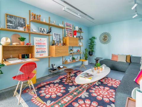 Royal System Shelving with HAY Mags Sofa, Hay Don't leave me Table, Nelson Tables and Eames Elliptical Table on a Maharam Mandala Rug.