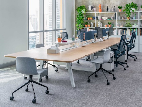 Byne System Desking with HAY AAC Chairs, Cosm Chairs, Ollin Monitor Arms and OE1 Storage Trolleys underneath.