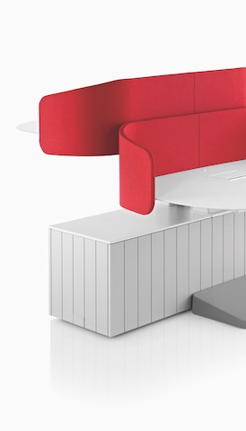 Two height-adjustable desks attached to a Locale workbase. Select to go to the Herman Miller desks and workspaces landing page.