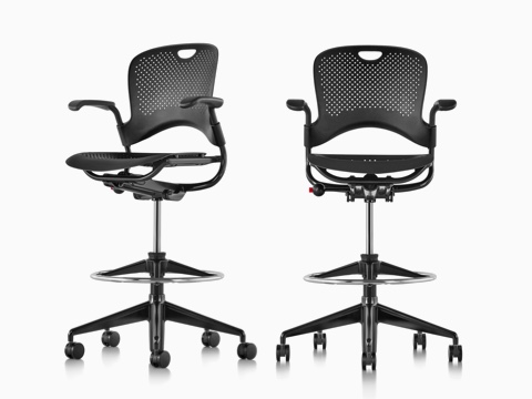 Oblique and front views of two black Caper Multipurpose Stools.