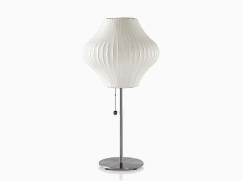 A white Nelson Pear Lotus Table Lamp.