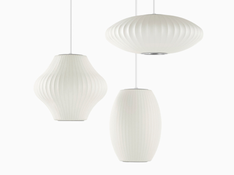 Nelson Bubble Lamps of three different shapes, all hanging from the same fixture.