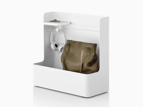 A Ubi Mobile Bag Catch containing earphones and a handbag.