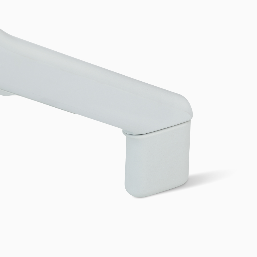 A close-up detail of the glide on a Fuld Nesting Chair.