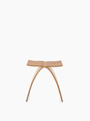 Front view of a Capelli Stool in a light wood finish.