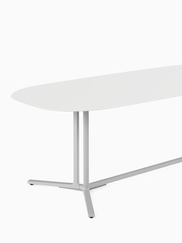 White oval Everywhere Table with grey legs. Select to go to the Everywhere Tables product page.