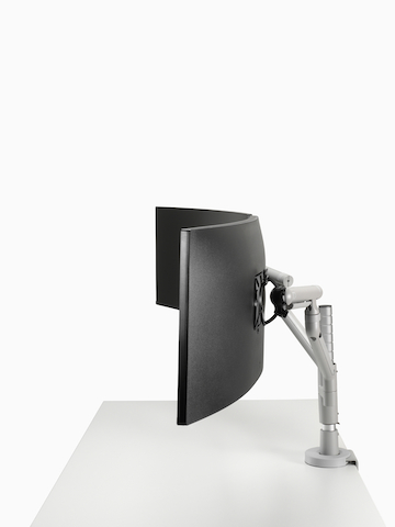 Dual Flo Modular monitor arms in silver, viewed from the side. Select to go to the Flo Modular product page.