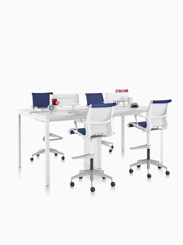 A standing-height Layout Studio table. Select to go to the Layout Studio product page.